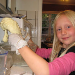 Kids making cheese!